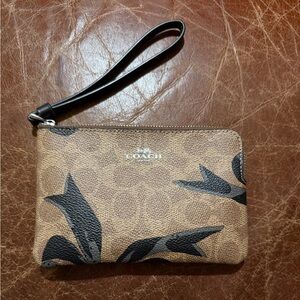 Coach Corner Zip Wristlet In Signature Canvas With Bow Print
